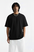 Essential Oversized Tee in Black - front view, premium cotton streetwear t-shirt