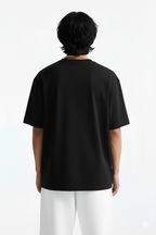 Essential Oversized Tee in Black - back view, oversized fit streetwear t-shirt